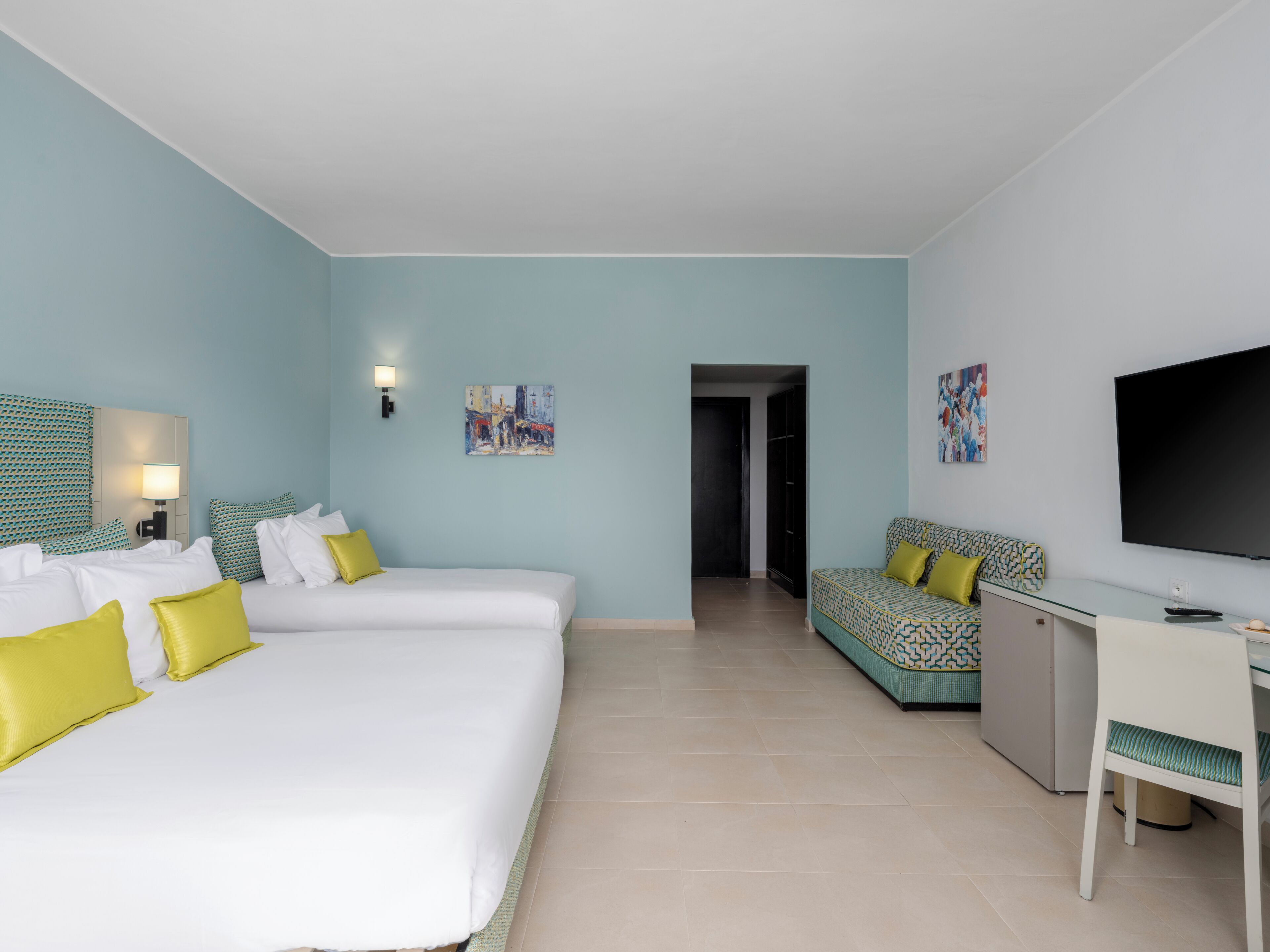 Standard Triple Room, Pool View | Minibar, in-room safe, blackout curtains, soundproofing