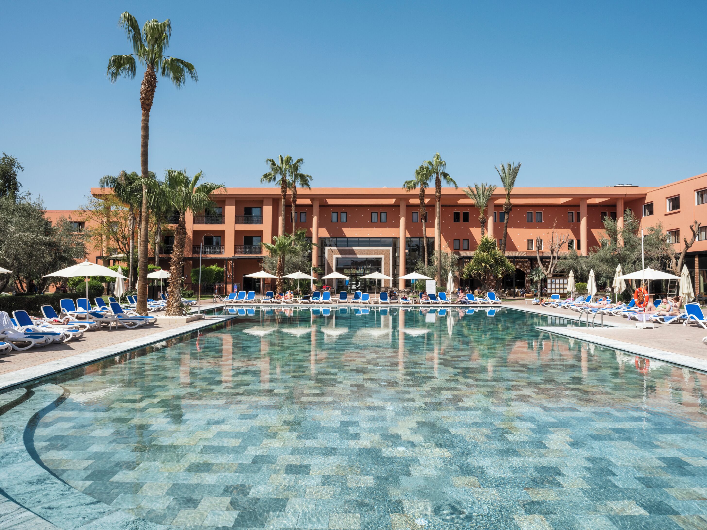3 outdoor pools, pool umbrellas