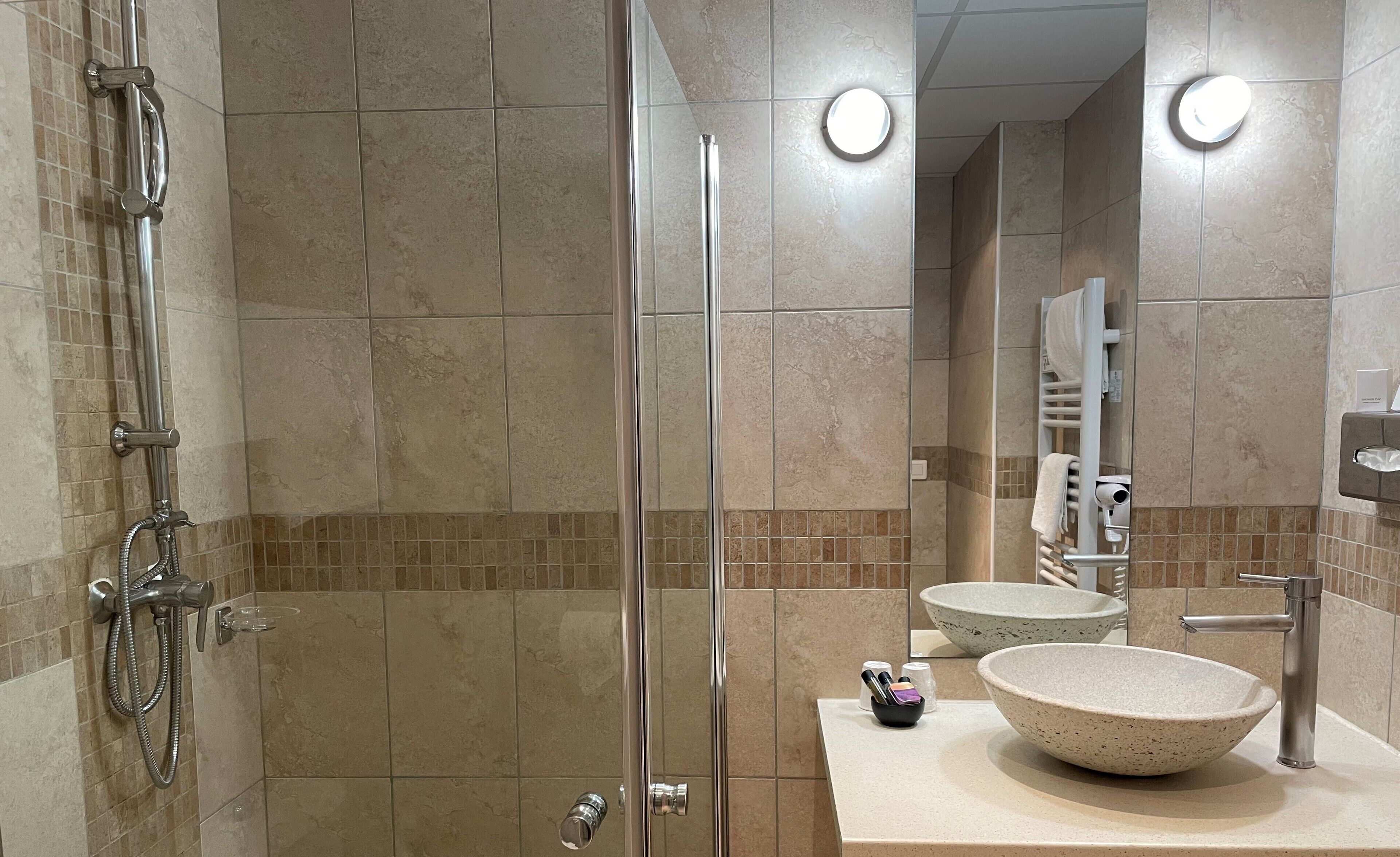 superior room | bathroom | shower, rainfall showerhead, free toiletries, hair dryer