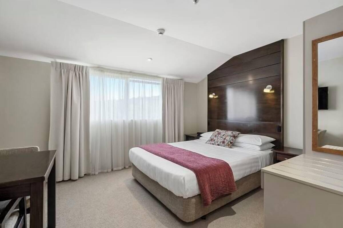 Premium bedding, blackout drapes, soundproofing, iron/ironing board