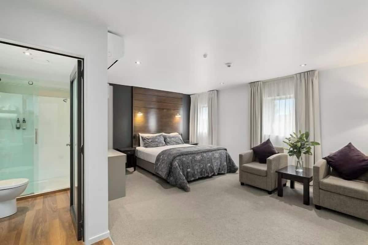 Premium bedding, blackout drapes, soundproofing, iron/ironing board