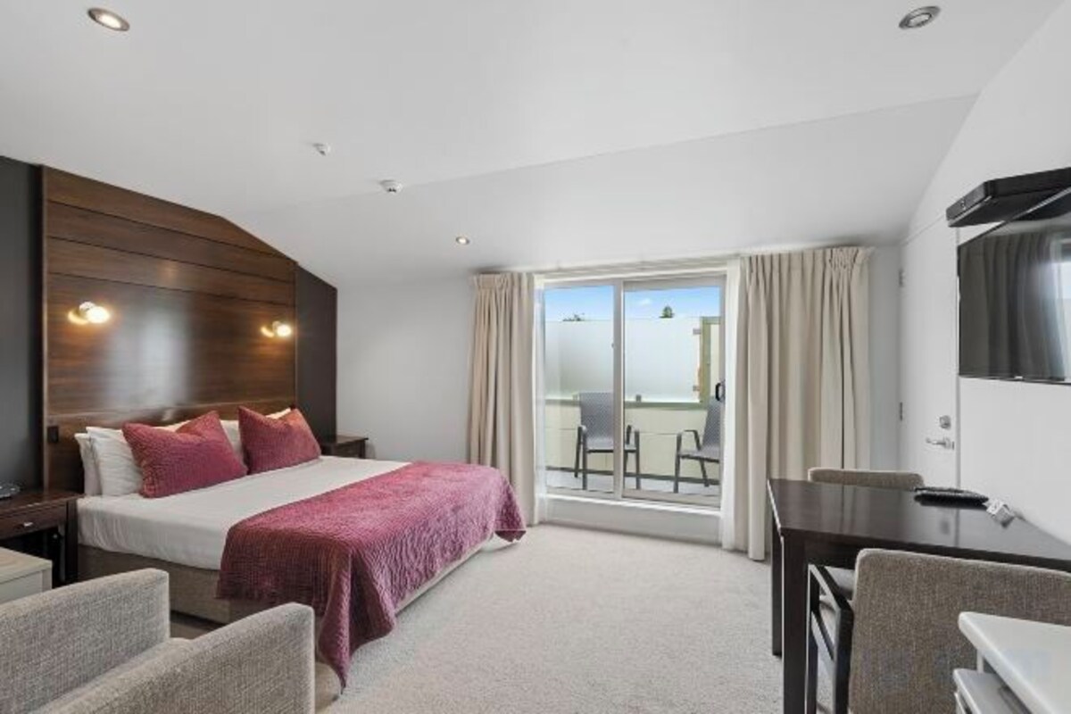 Premium bedding, blackout drapes, soundproofing, iron/ironing board