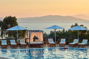 Outdoor pool, pool umbrellas, pool loungers