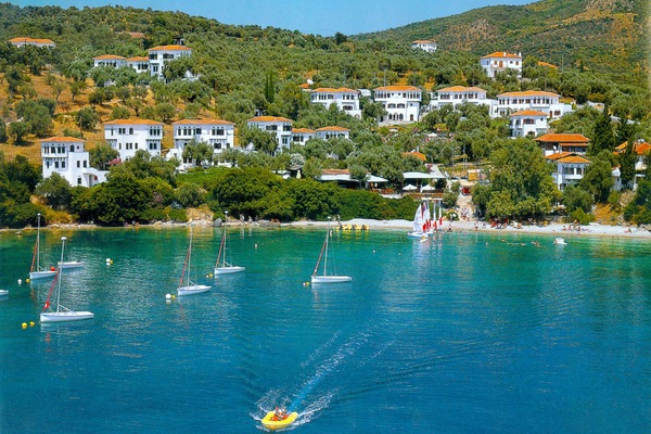 On the beach, sun loungers, beach umbrellas, scuba diving