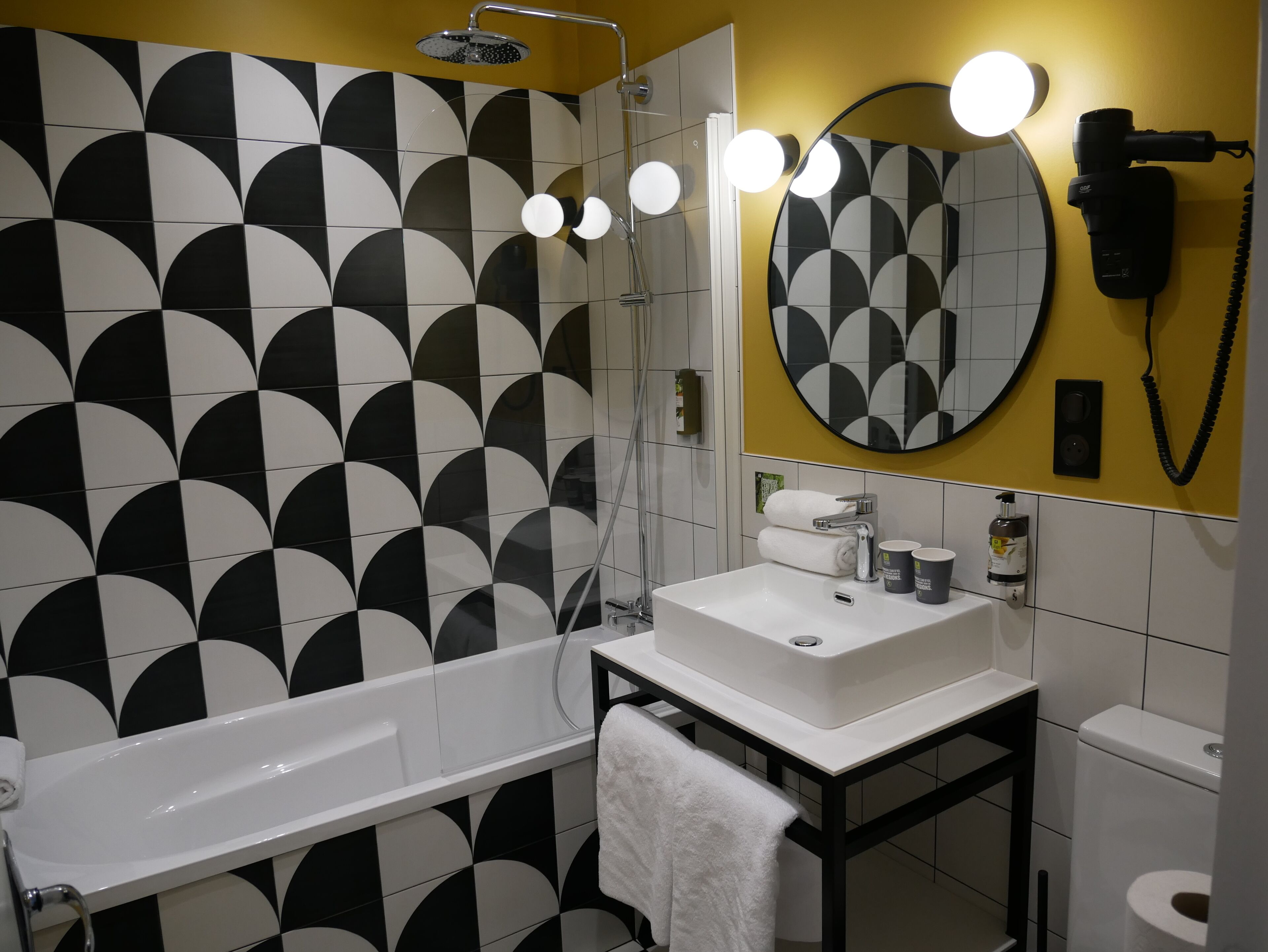 superior double room | bathroom | rainfall showerhead, hair dryer, towels