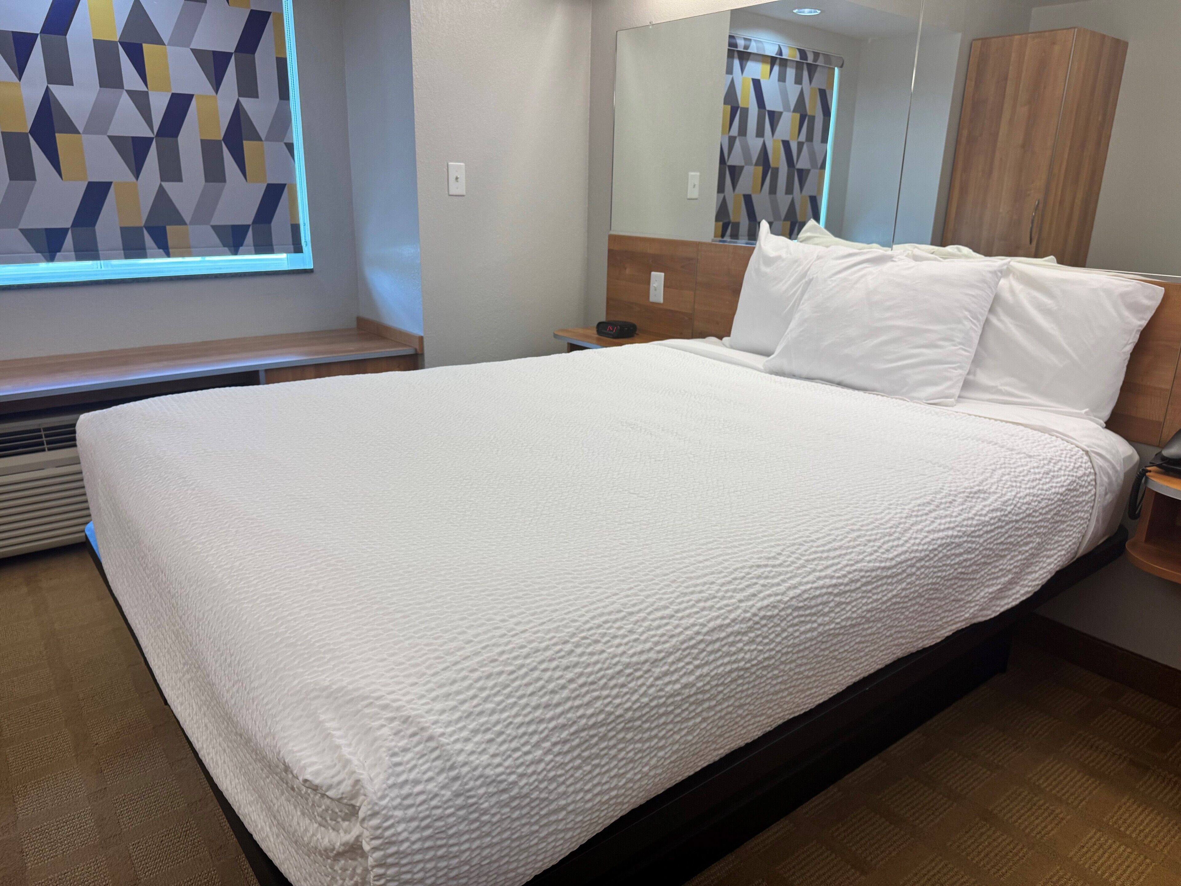 premium bedding, individually decorated, individually furnished, desk