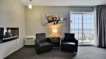 HOTEL | Suite 1 King bed River view | Living area | 32-inch TV with cable channels