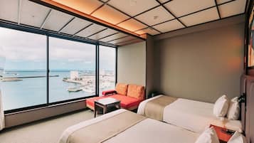 Deluxe Twin Room With Sea View | Down comforters, in-room safe, desk, blackout drapes