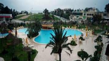 Indoor pool, seasonal outdoor pool, pool umbrellas, pool loungers