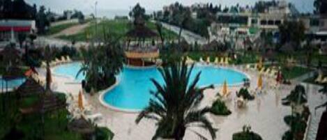 Indoor pool, seasonal outdoor pool, pool umbrellas, sun loungers