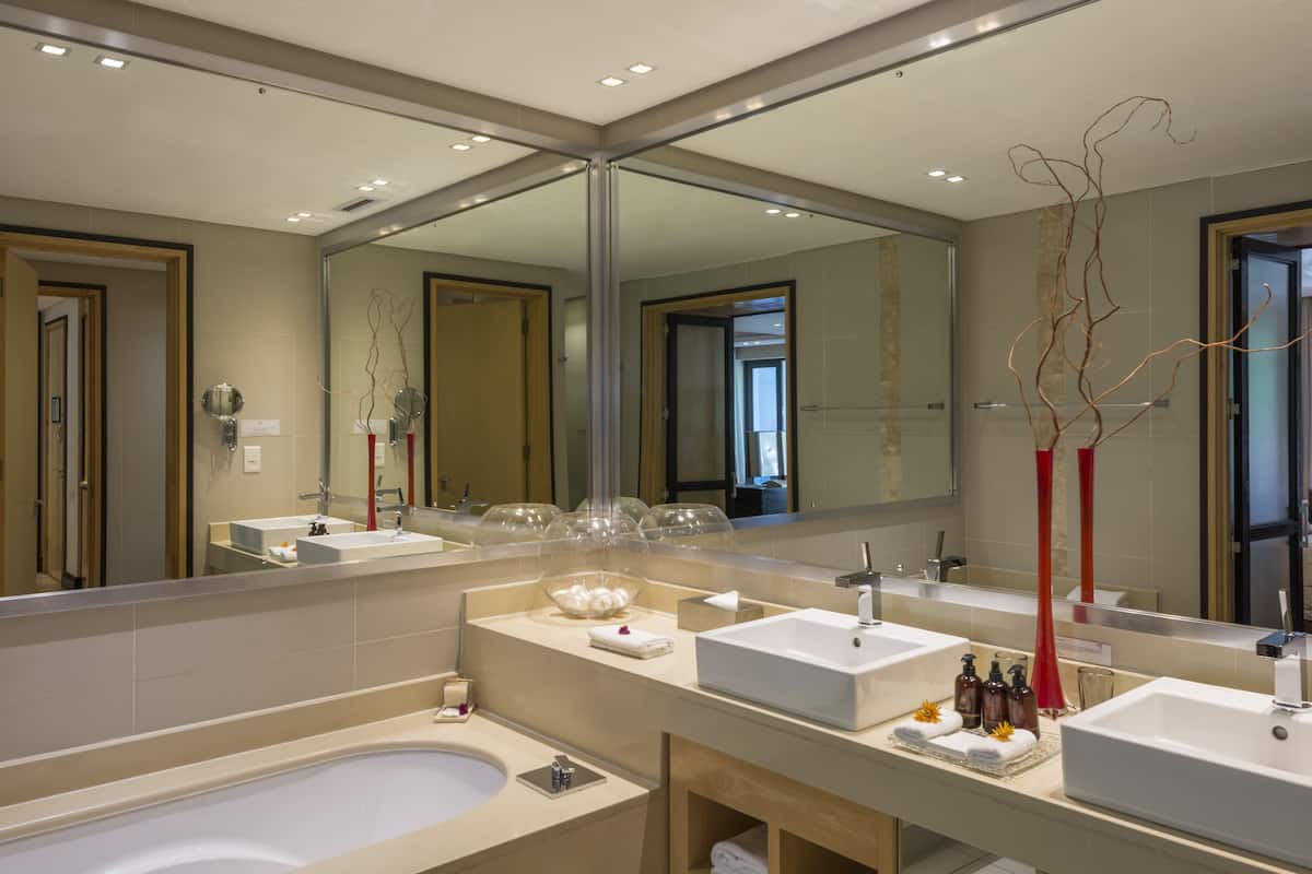 separate bathtub and shower, designer toiletries, hair dryer, bathrobes