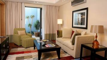 Suite Luxe, 1 grand lit et 1 canapé-lit | Coin séjour