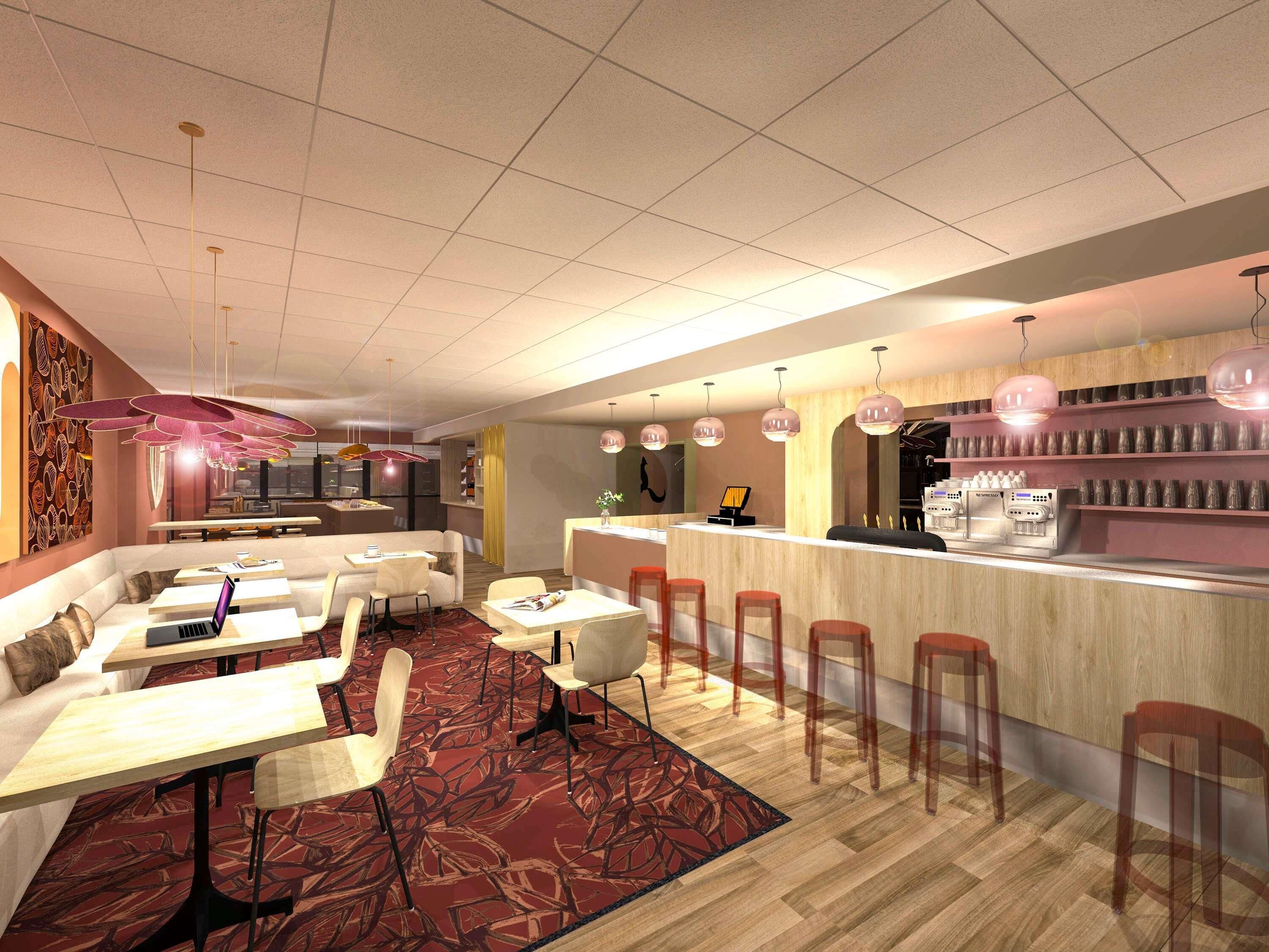 A modern restaurant with a bar area, seating arrangements, and a coffee machine.