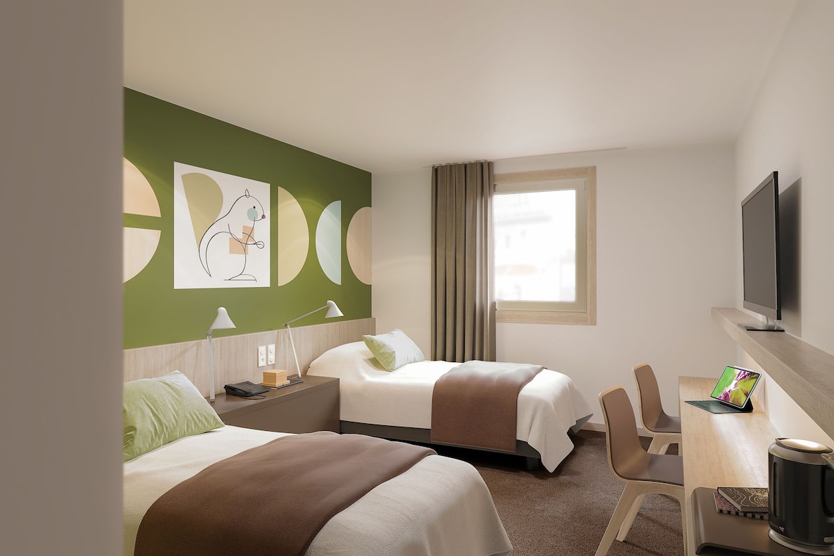 standard room, 2 single beds | premium bedding, individually decorated, individually furnished, desk