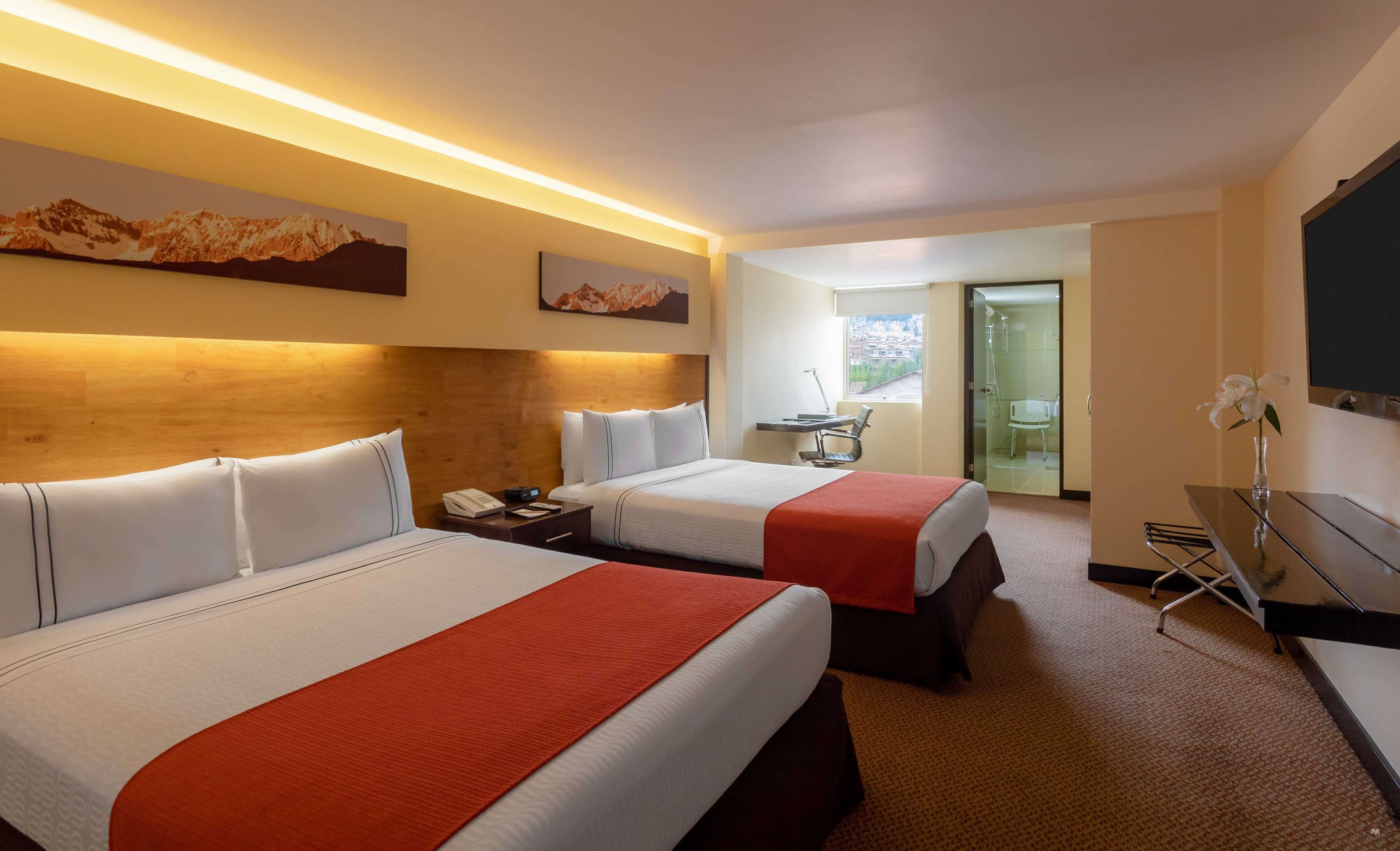 Premium bedding, down comforters, Select Comfort beds, minibar
