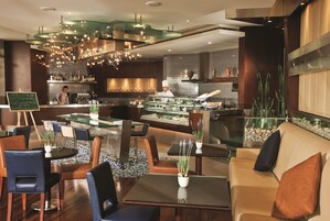 Rooftop bar, pool views, open daily