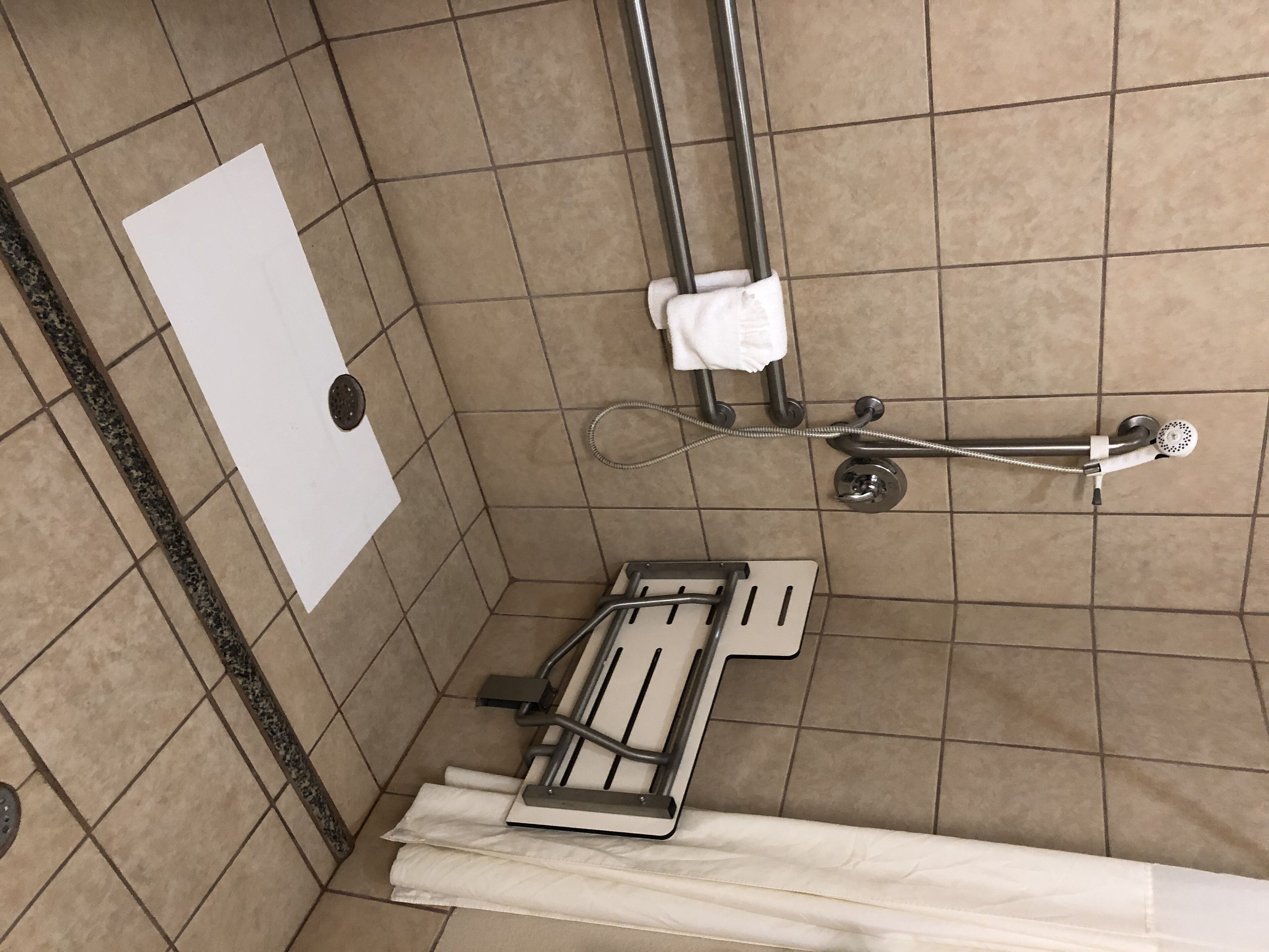 room, 1 king bed, accessible, non smoking (mobility,hearing,tub w/grab bars) | bathroom | combined shower/bathtub, free toiletries, hair dryer, towels