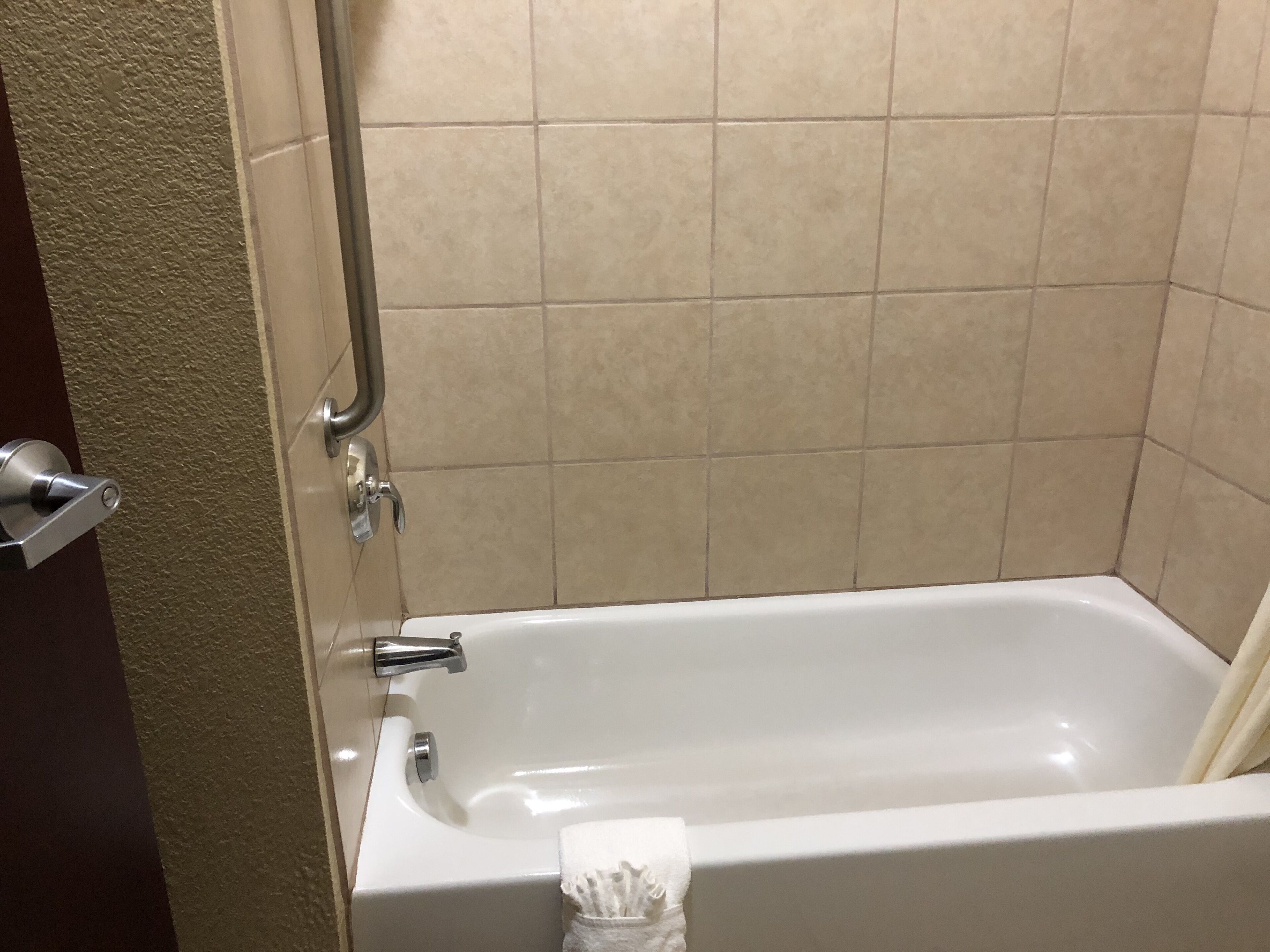combined shower/bathtub, free toiletries, hair dryer, towels
