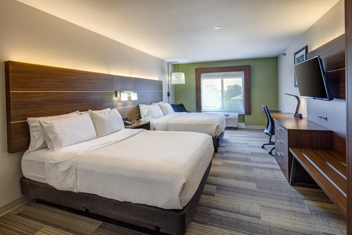 Premium bedding, down duvets, pillow-top beds, in-room safe