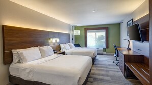 A hotel room with two beds, a desk, a chair, a TV, and a window. - Holiday Inn Express & Suites Shelbyville Indianapolis by IHG (Shelbyville)