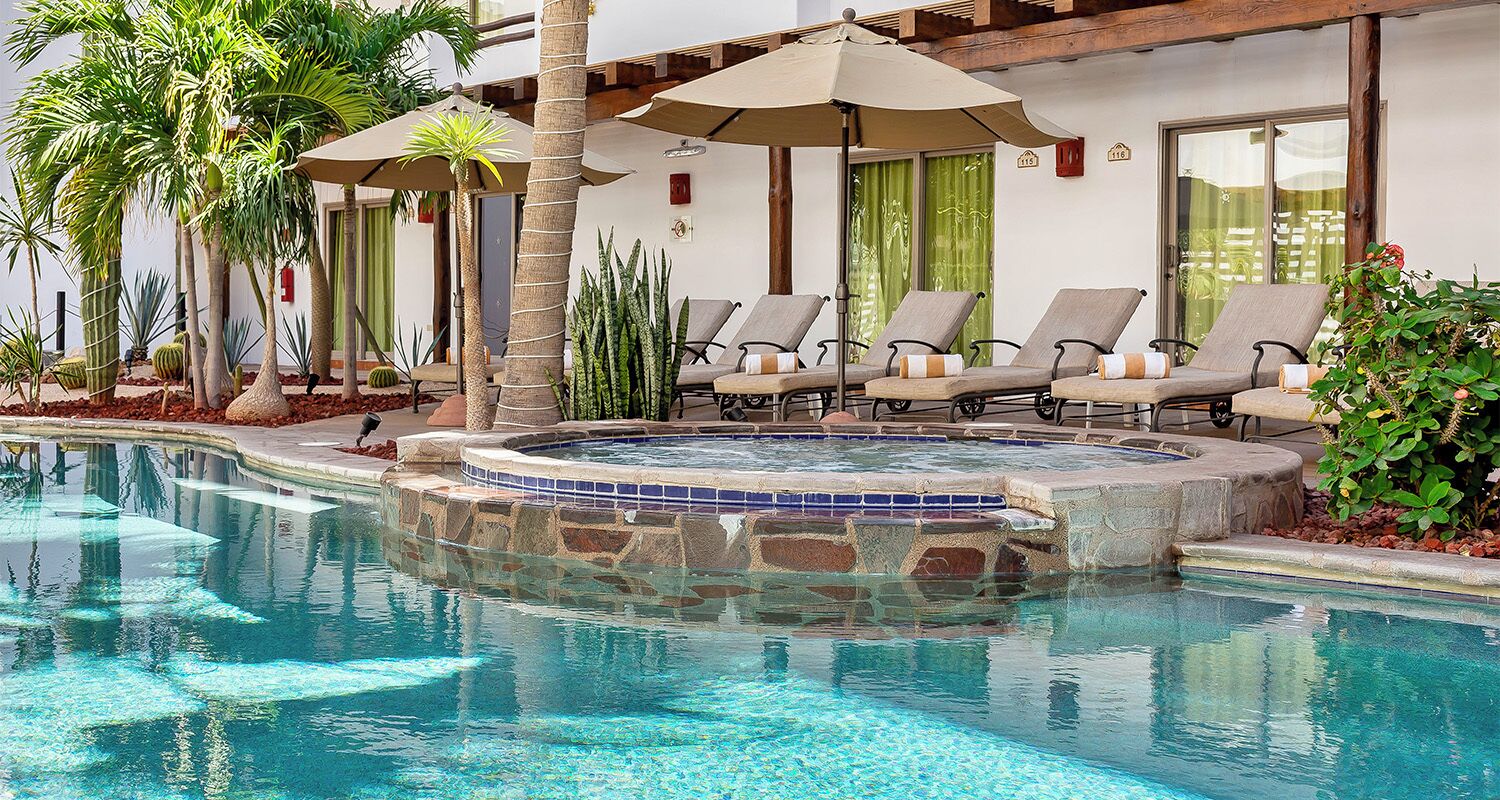 Outdoor pool, pool umbrellas, sun loungers