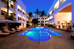 Outdoor pool, open 8:00 AM to 8:00 PM, pool umbrellas, pool loungers