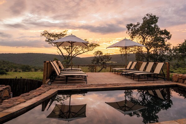 Outdoor pool, pool umbrellas, pool loungers