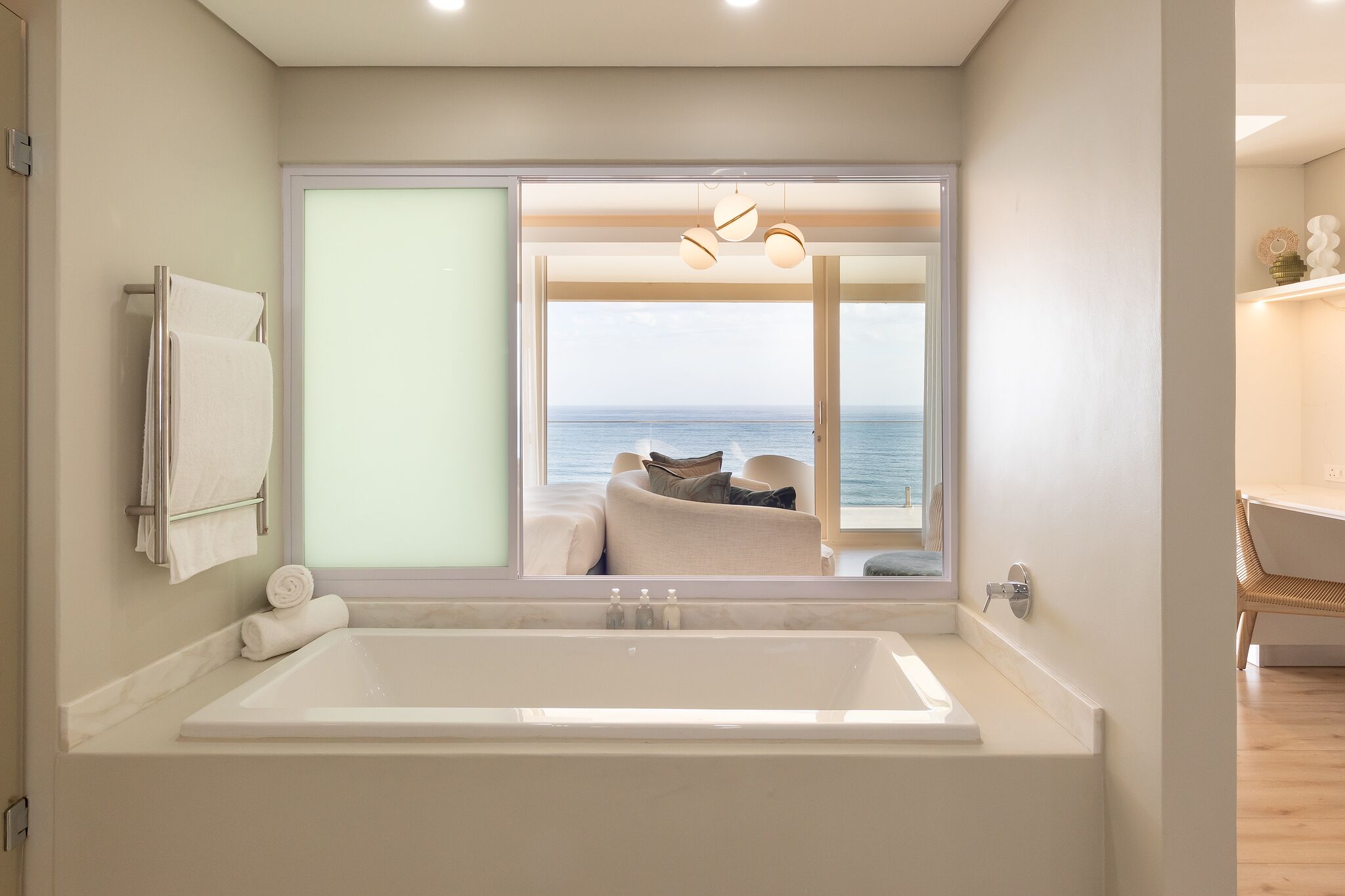 sea facing suite | bathroom | separate bathtub and shower, free toiletries, hair dryer, bathrobes