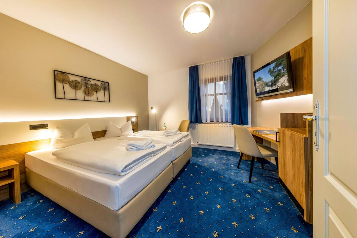 In-room safe, desk, cribs (free), rollaway beds (surcharge)