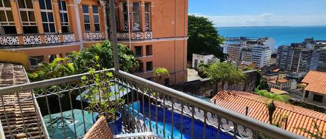 Outdoor pool, open 7:00 AM to 8:00 PM, pool umbrellas, sun loungers