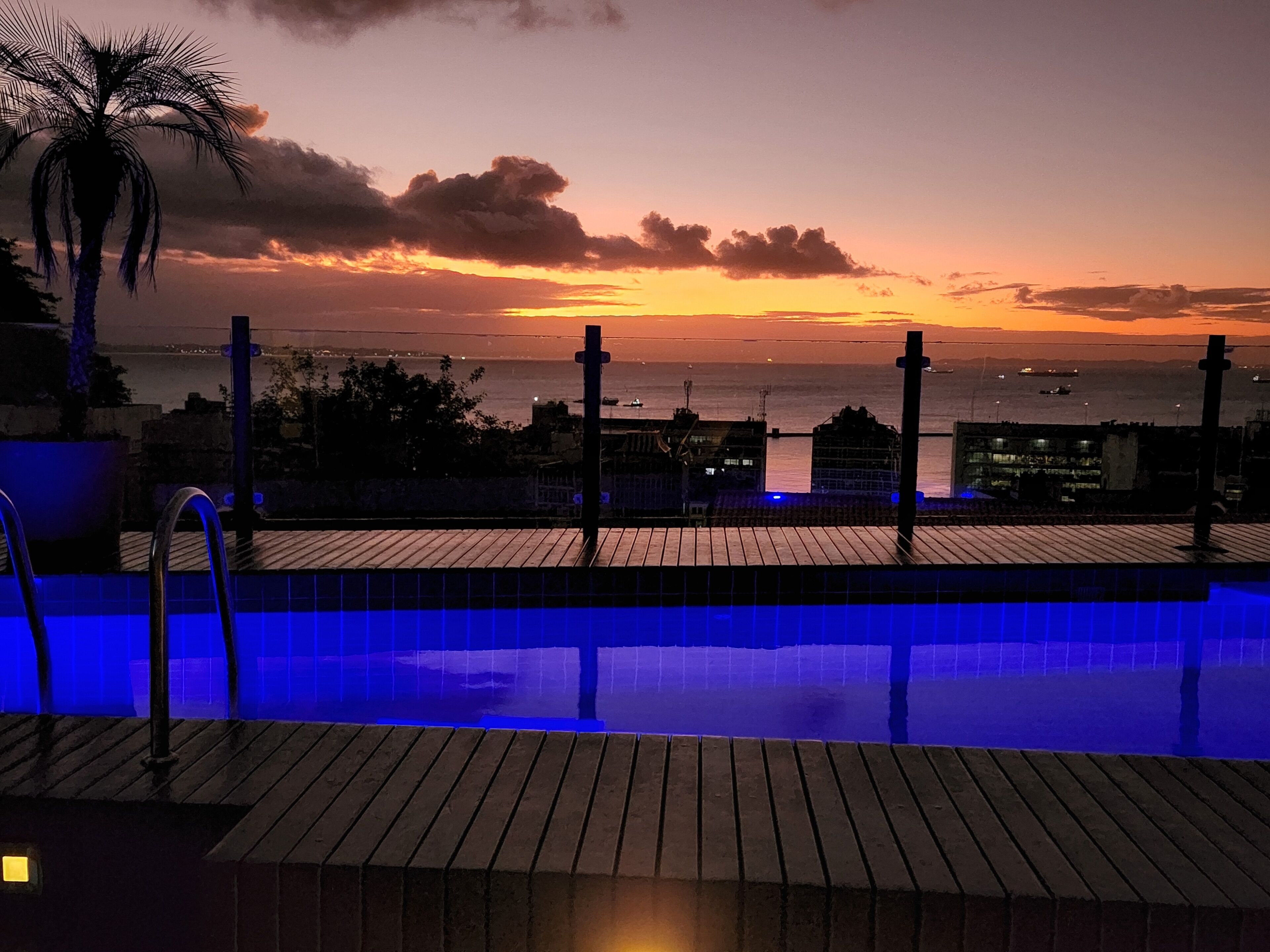 outdoor pool, open 7:00 am to 8:00 pm, pool umbrellas, pool loungers