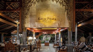 A traditional wooden structure with a sign reading "KHUM PHAYA RESORT & SPA". - Khum Phaya Resort & Spa Boutique Collection (Chiang Mai)