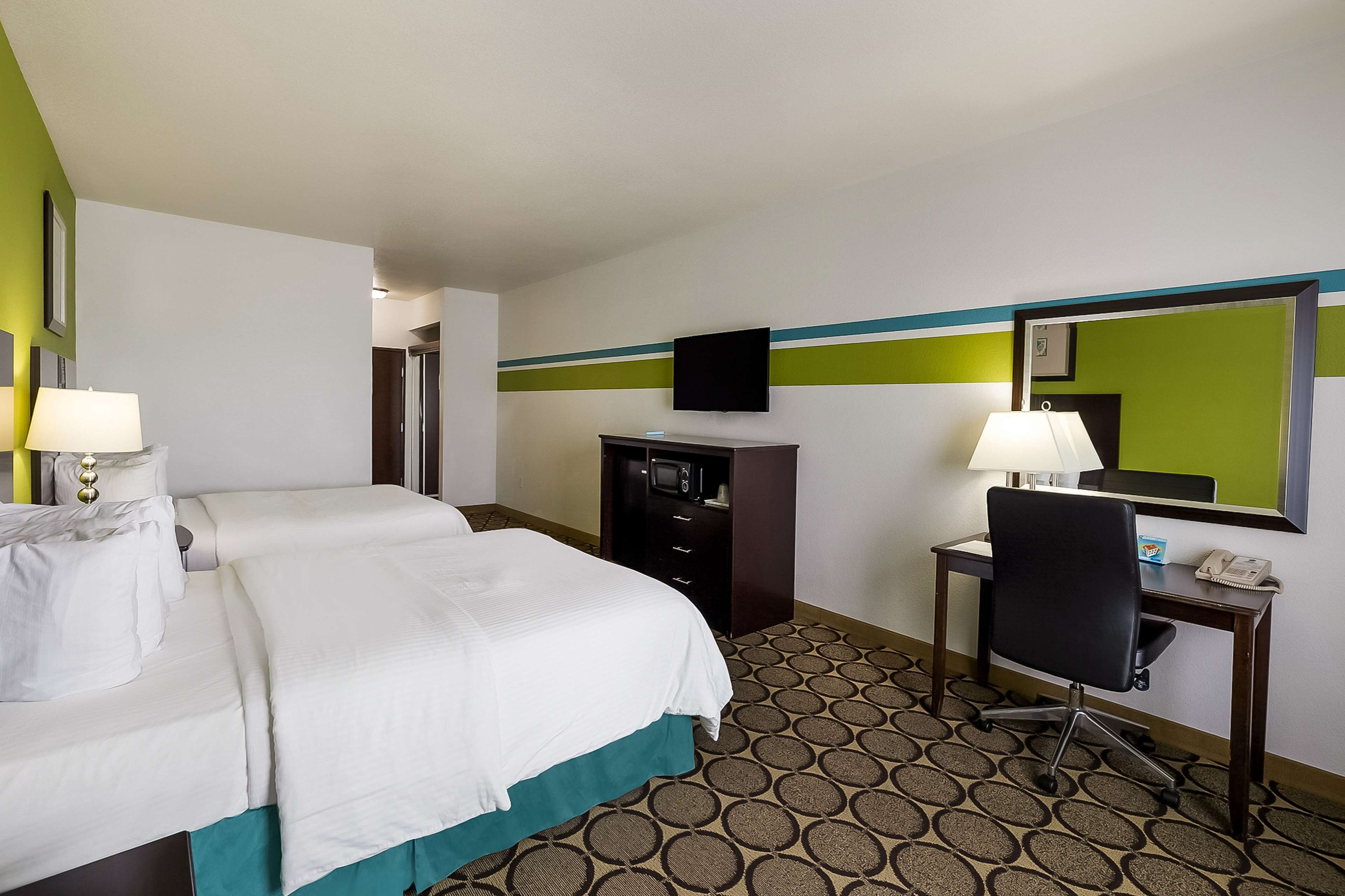 desk, laptop workspace, iron/ironing board, free cots/infant beds