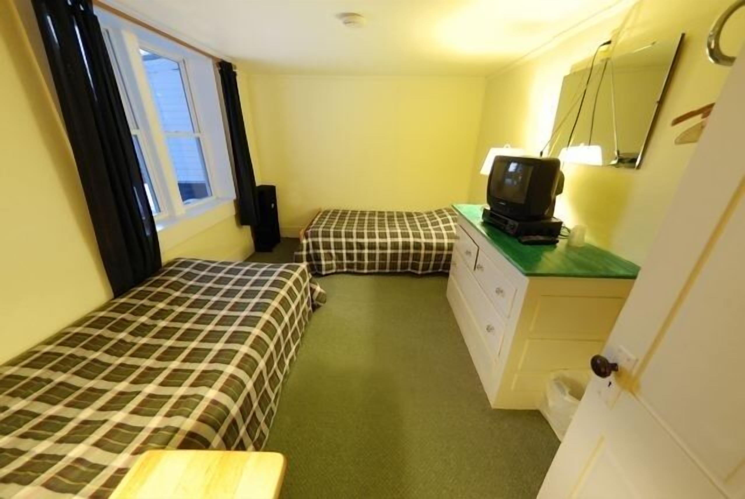 blackout curtains, free wifi, bed sheets, alarm clocks