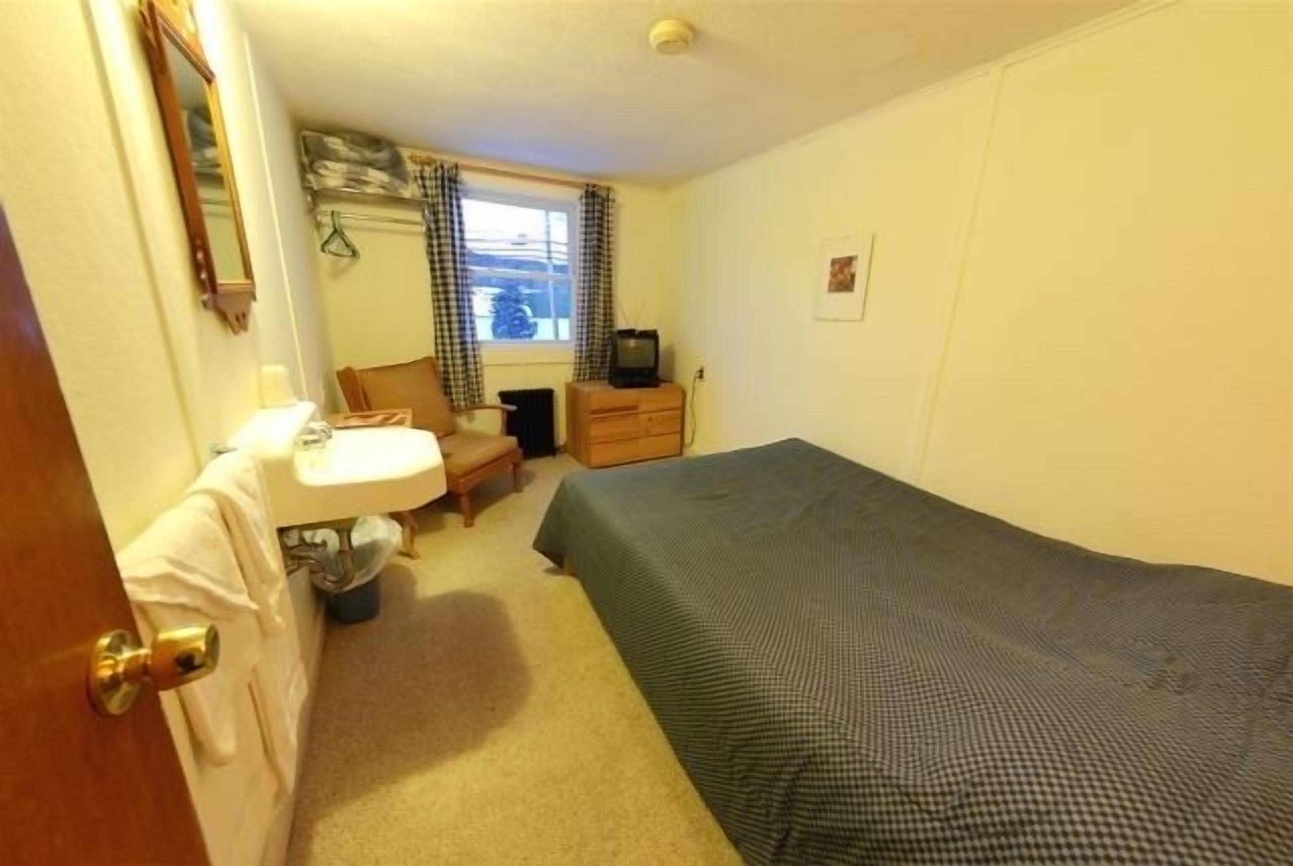 blackout curtains, free wifi, bed sheets, alarm clocks