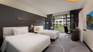 Premium bedding, down comforters, pillowtop beds, minibar