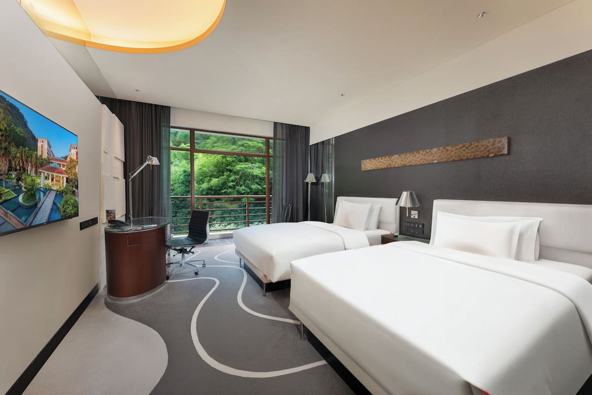 Premium bedding, down comforters, pillowtop beds, minibar