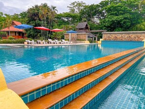 Outdoor pool, open 8:00 AM to 7:00 PM, free pool cabanas, pool umbrellas