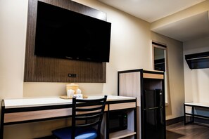 Standard Room, 1 King Bed | Living area | 32-inch LCD TV with satellite channels, TV