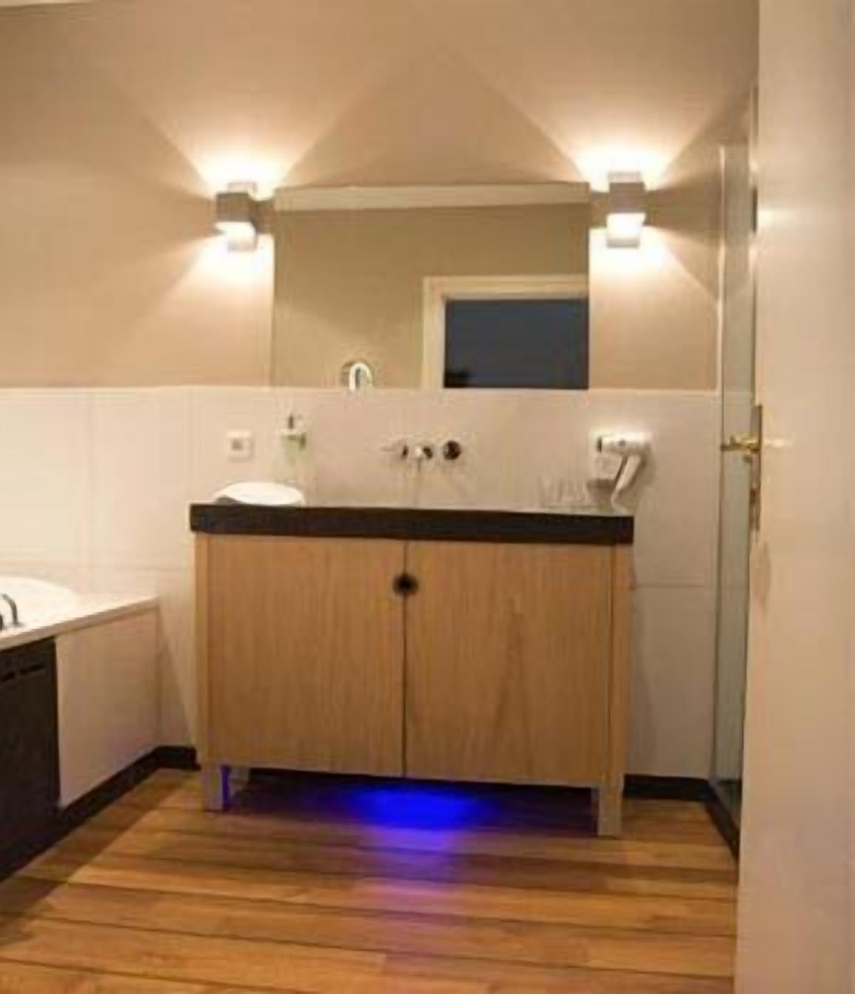 hair dryer, bathrobes, bidet, towels