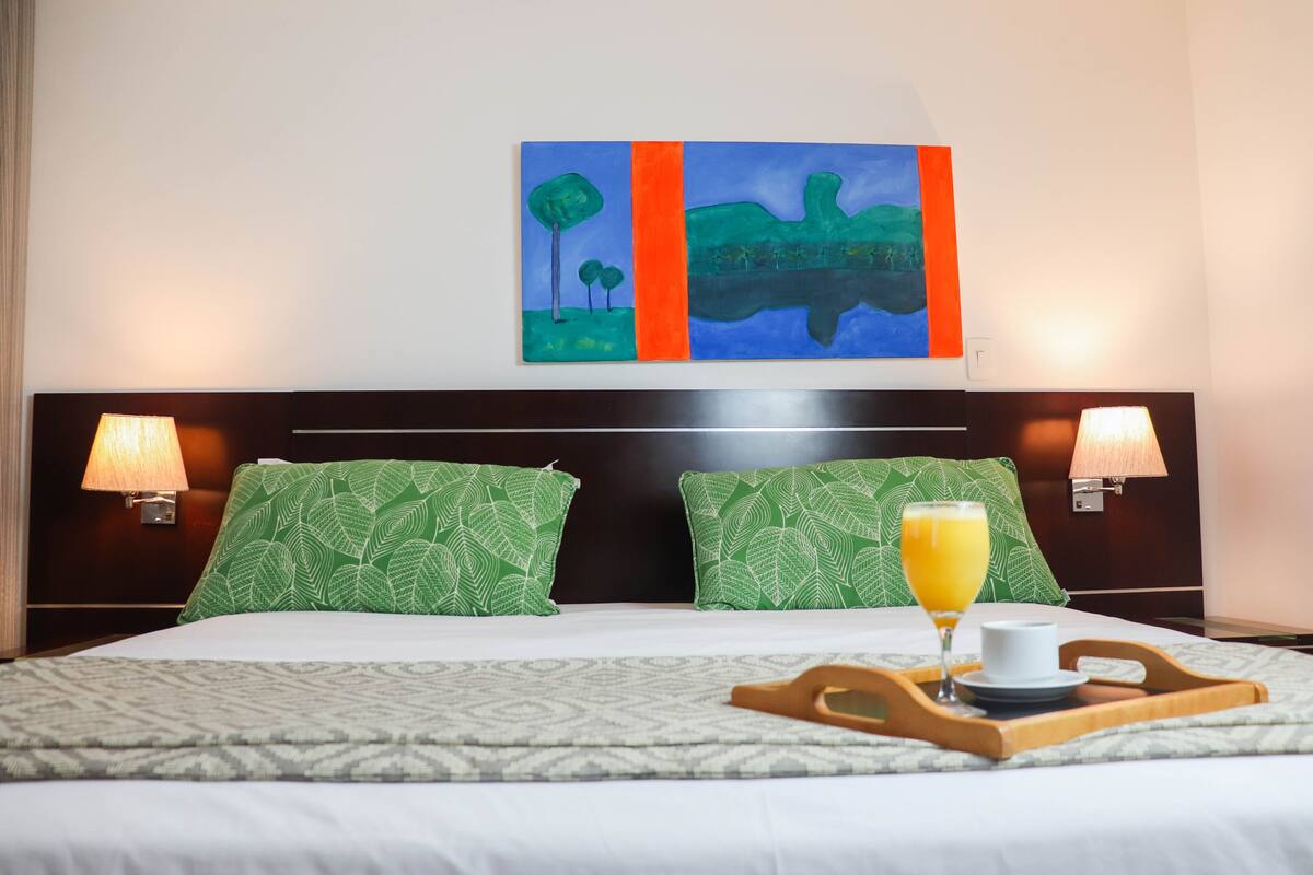 deluxe double room | minibar, in-room safe, desk, blackout curtains