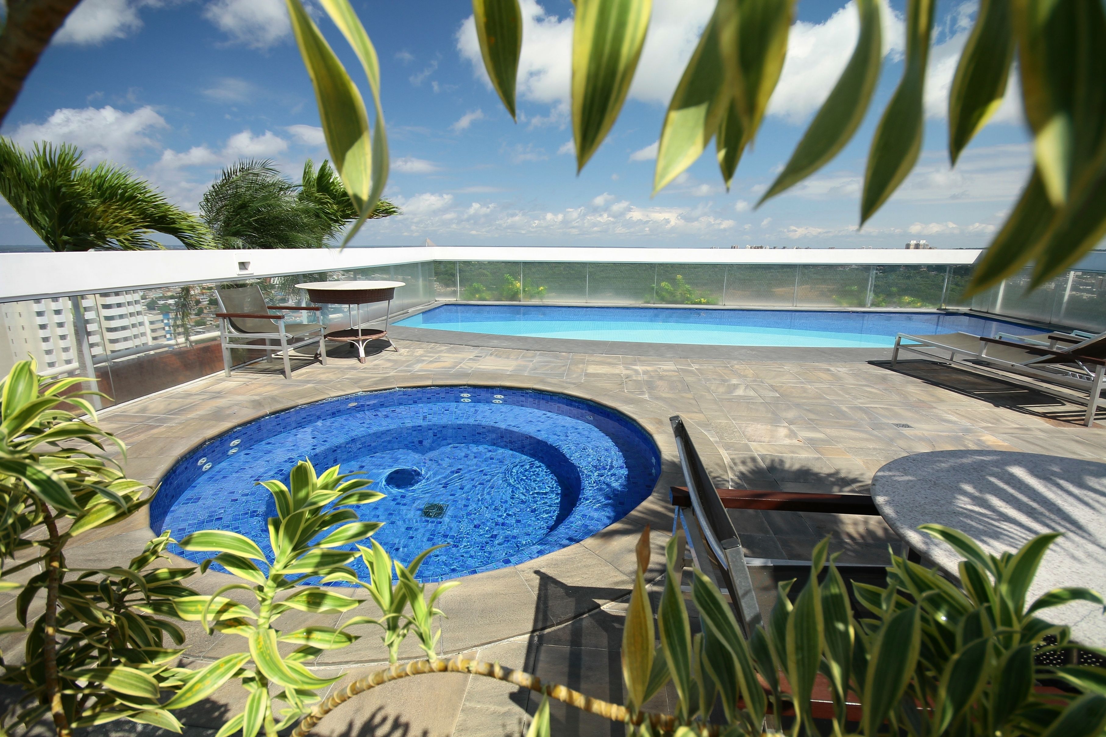 outdoor pool, pool umbrellas, pool loungers