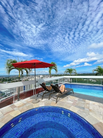 Outdoor pool, pool umbrellas, sun loungers