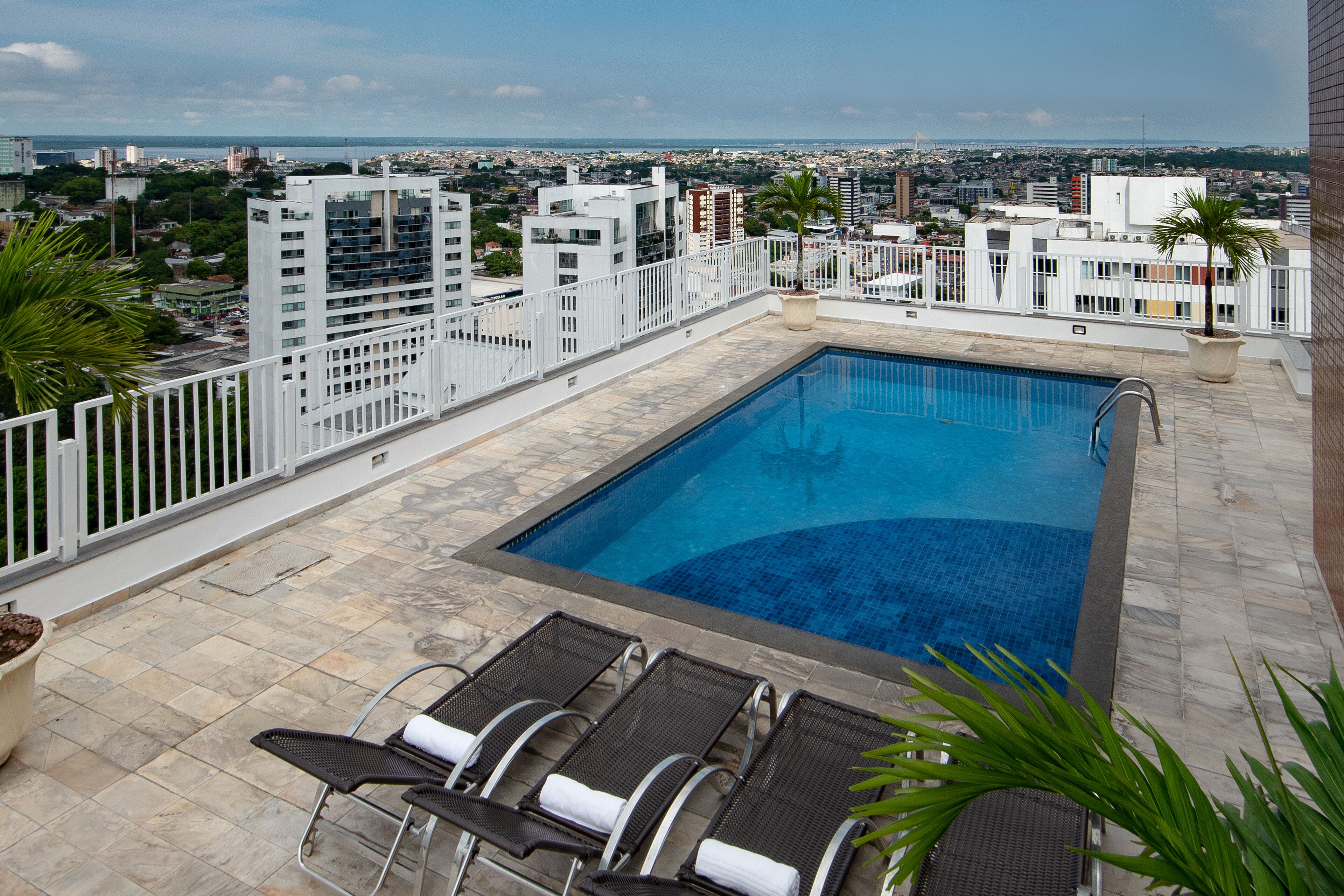 outdoor pool, pool loungers