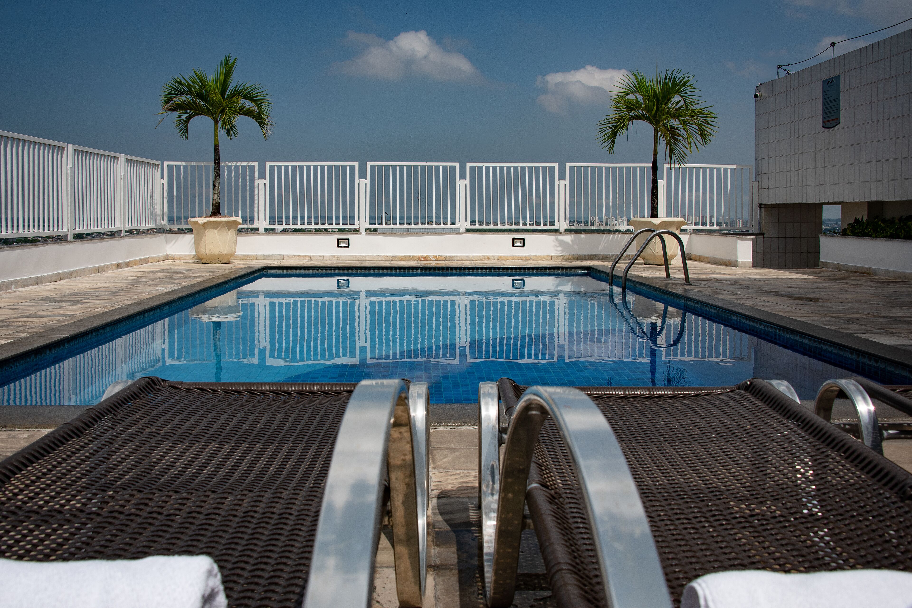 outdoor pool, pool loungers