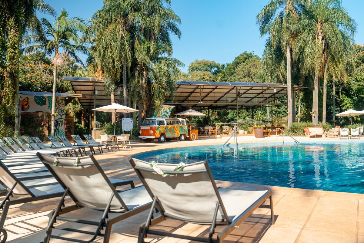 Indoor pool, outdoor pool, open 8 AM to 10 PM, pool umbrellas