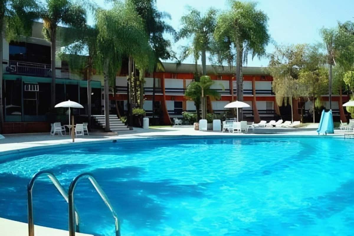 Pool | Indoor pool, outdoor pool, open 8 AM to 10 PM, pool umbrellas