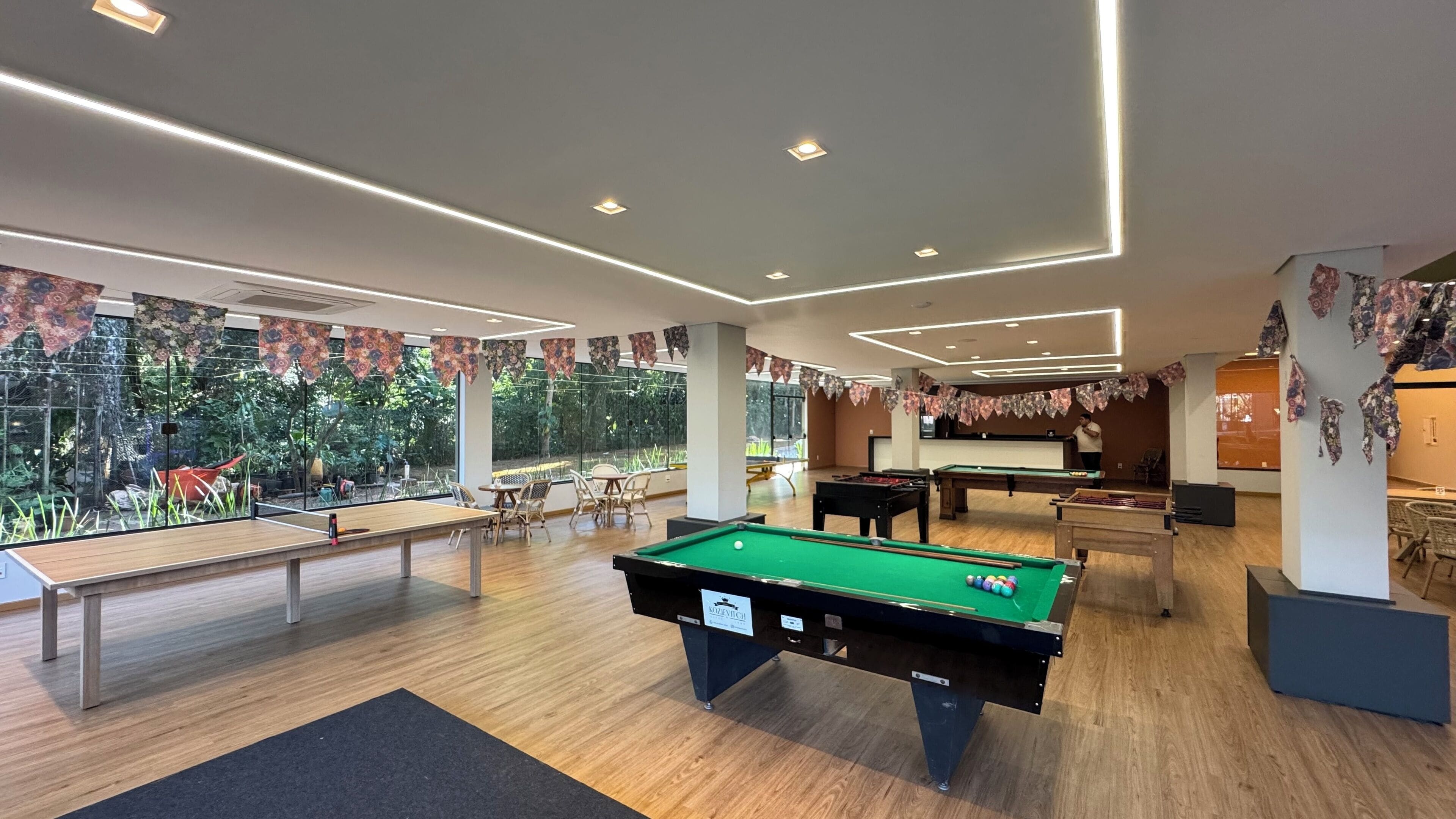 50-inch tv with cable channels, table football, ping pong