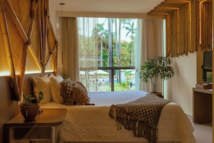 Suite Deluxe | Minibar, caja fuerte, escritorio y espacio para trabajar con un portátil