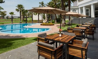 Outdoor pool, open 8:00 AM to 8:00 PM, sun loungers
